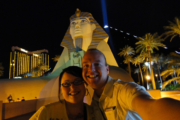 Night time selfie of Maranda and Arnold in front of Luxor in Las Vegas.