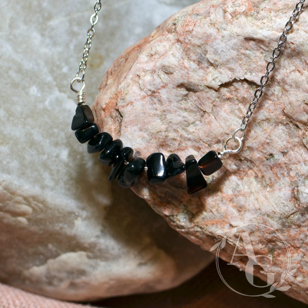 Onyx bead chips on a bar necklace from Awaken Gemini on Etsy.