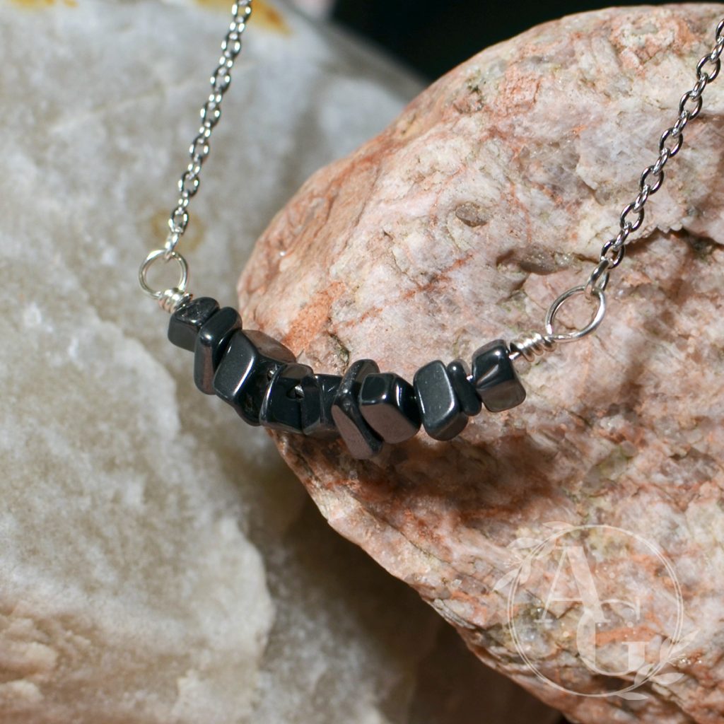 Hematite bead chips on a bar necklace from Awaken Gemini on Etsy.