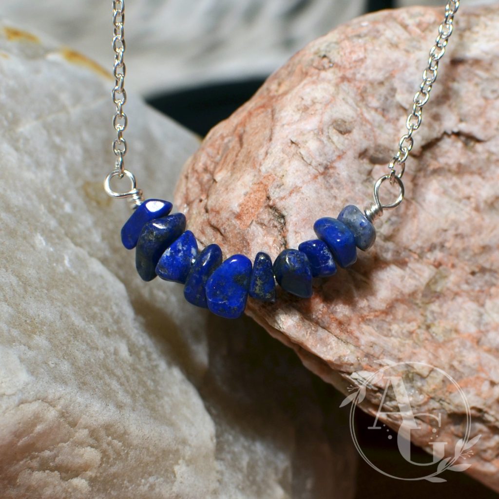 Lapis lazuli bead chips on a bar necklace from Awaken Gemini on Etsy.