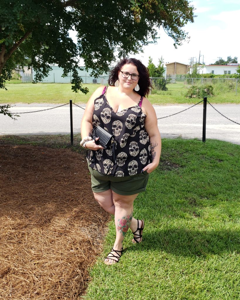 Maranda, a plus size woman, stands outdoors wearing a Shein tank top, Walmart shorts, and Torrid sandals.