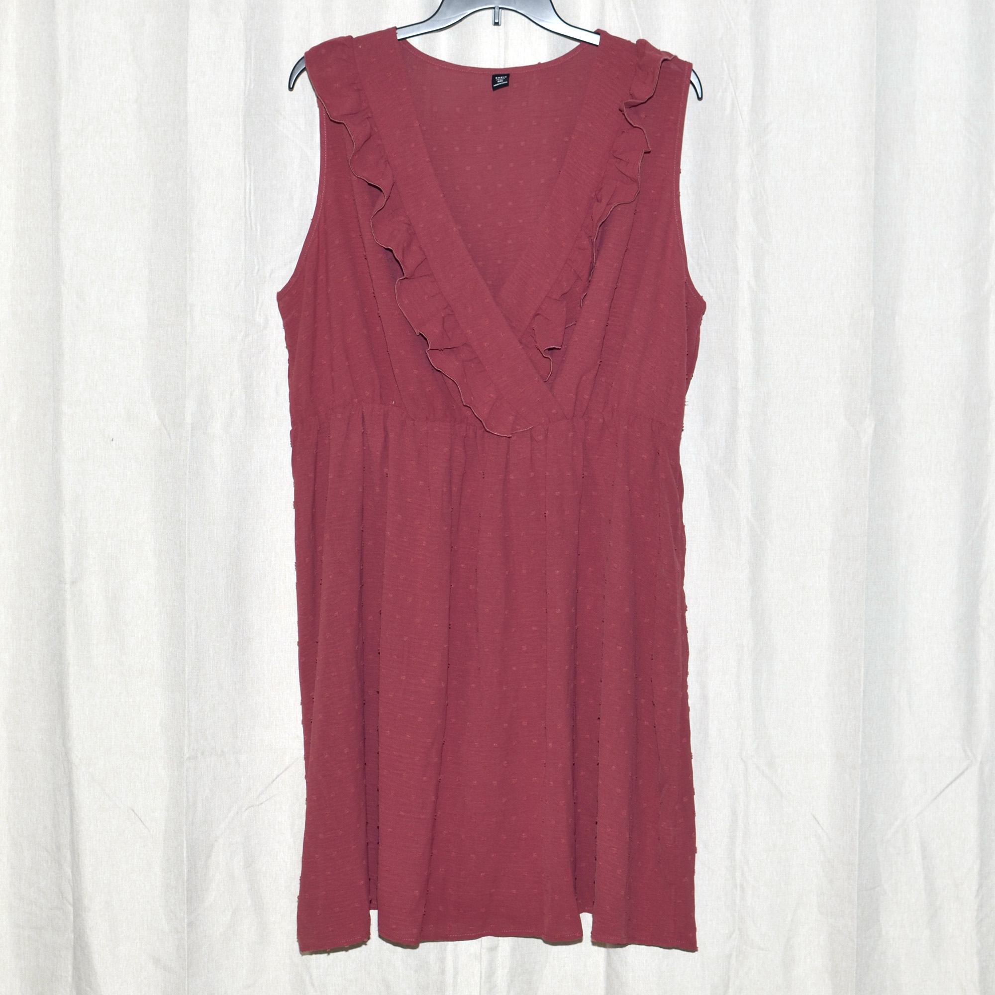 Plus size brick red dobby textured sleeveless dress from Shein featuring ruffle trim accents on the surplice bodice.